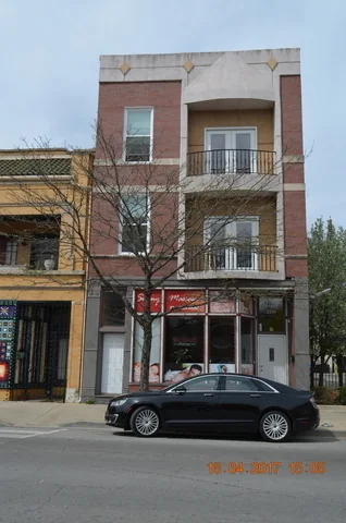 Historical mixed-use property photograph · Logan Square